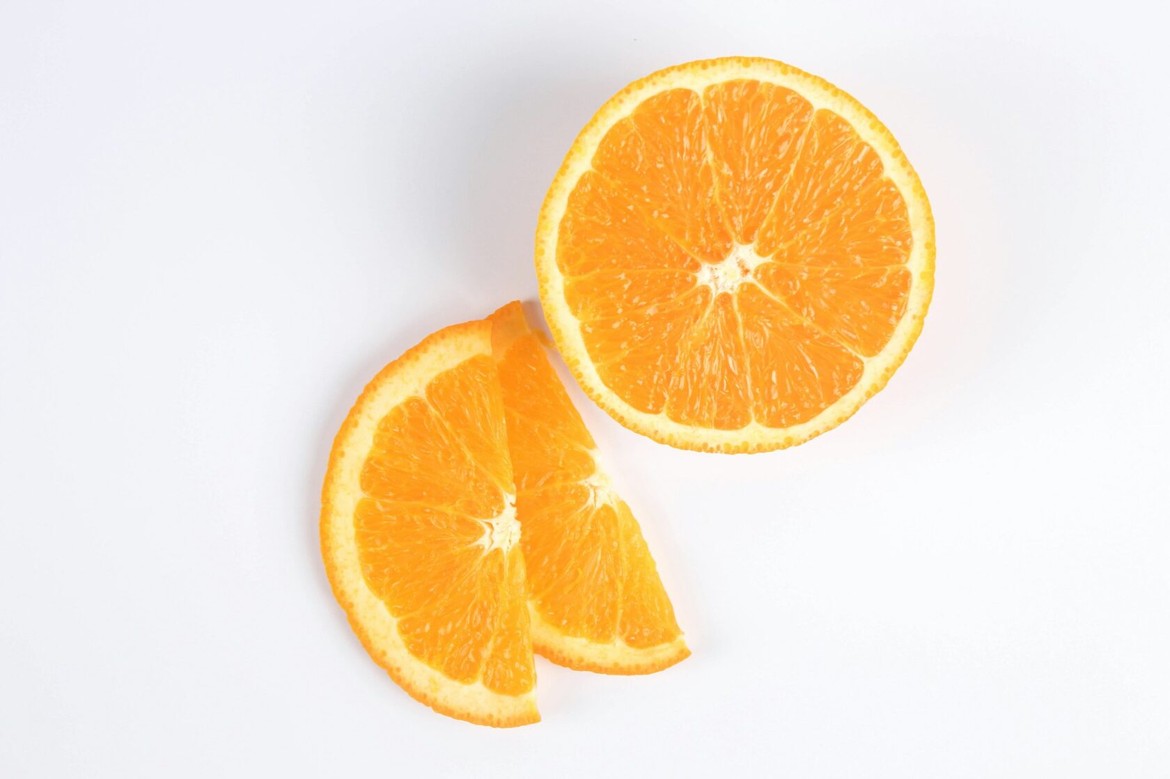 A round bright-orange Coin Volcano citrus candy